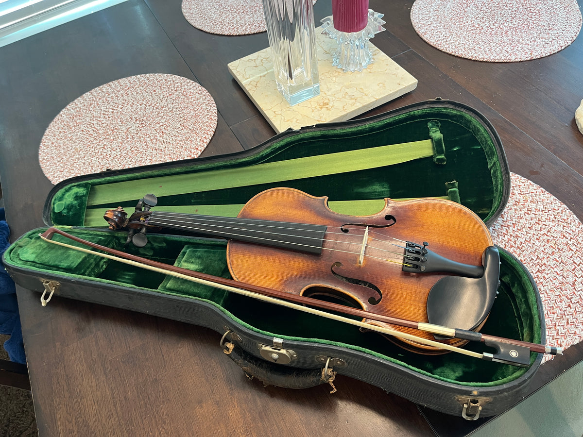 Full size violin labeled John Juzek Violinmaker in Prague violin with case and bow 4/4