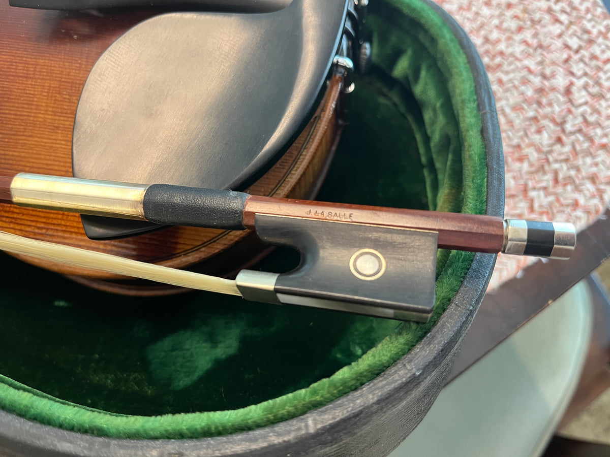 Full size violin labeled John Juzek Violinmaker in Prague violin with case and bow 4/4